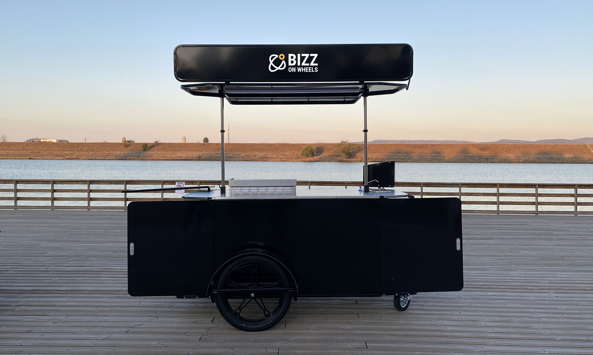 Large bbq grill food cart made by Bizz On Wheels